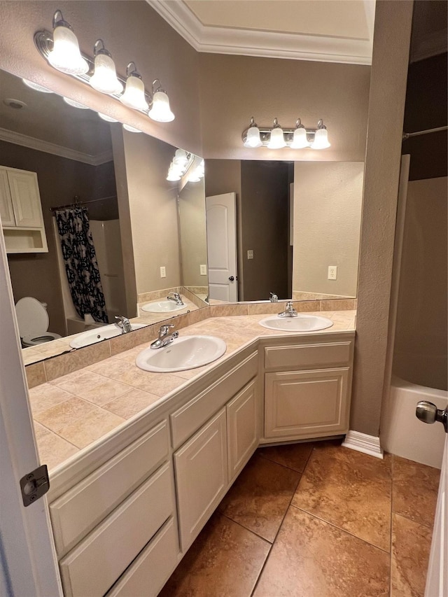 bathroom featuring tile patterned flooring, vanity, crown molding, and shower / bathtub combination with curtain