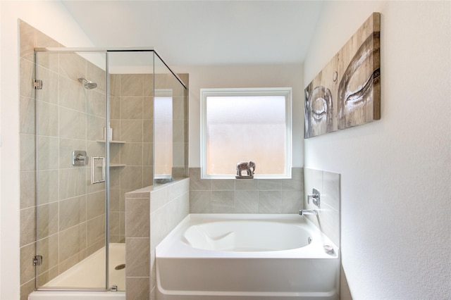 bathroom with separate shower and tub