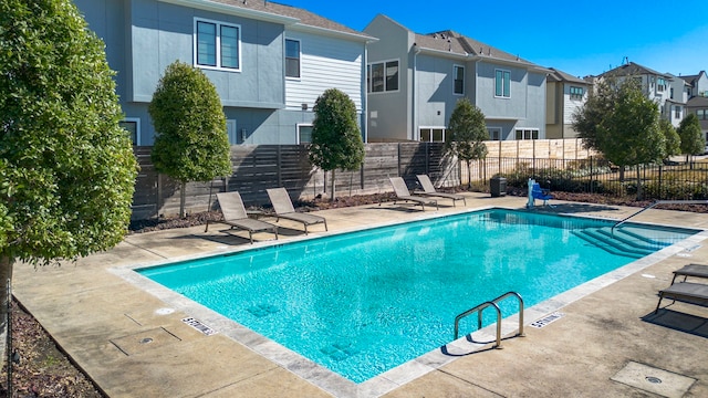 view of pool featuring a patio