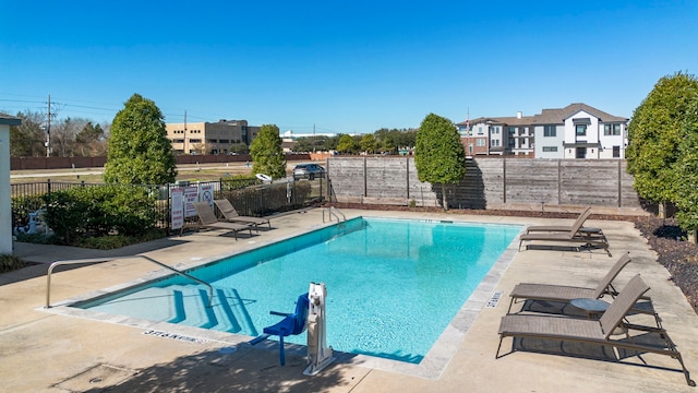 view of pool featuring a patio area