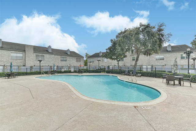 view of pool with a patio