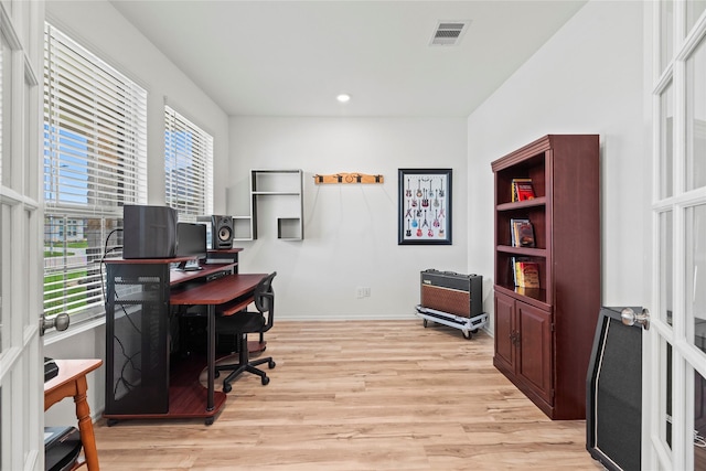 home office with light wood-type flooring