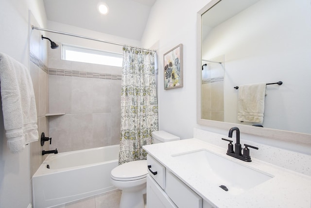 full bathroom featuring tile patterned flooring, vanity, shower / bath combo with shower curtain, and toilet