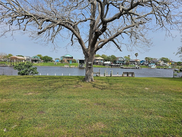 view of yard featuring a gazebo and a water view