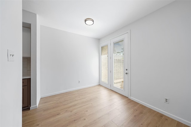 unfurnished room featuring light wood-type flooring