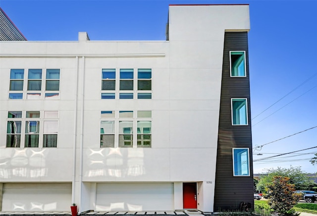 view of building exterior featuring a garage