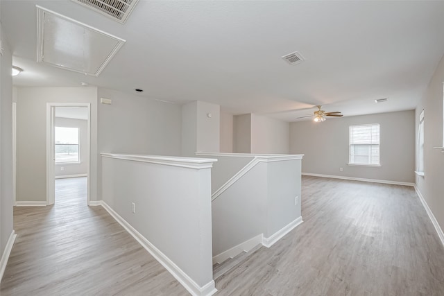 hallway featuring light wood-type flooring