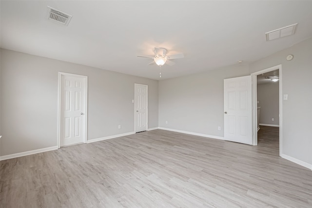 unfurnished room featuring ceiling fan and light hardwood / wood-style floors