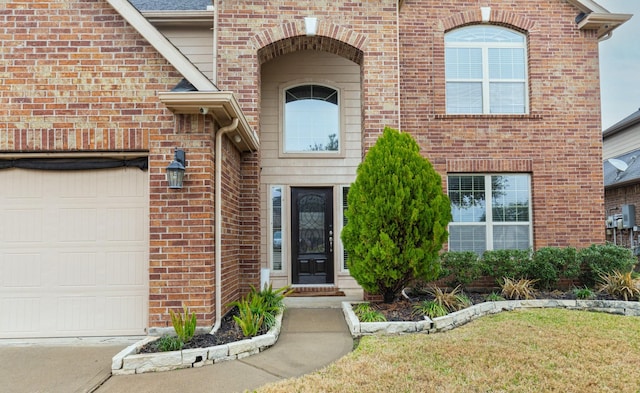 property entrance featuring a yard