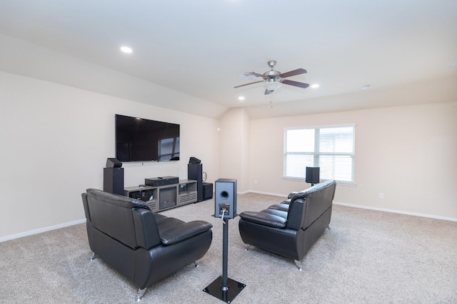 carpeted living room with lofted ceiling and ceiling fan