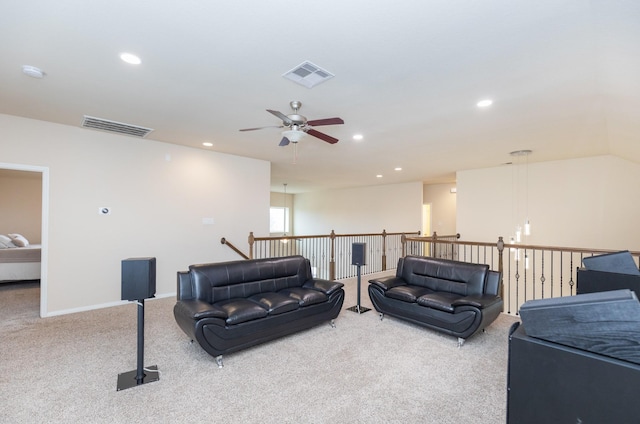 carpeted living room featuring ceiling fan