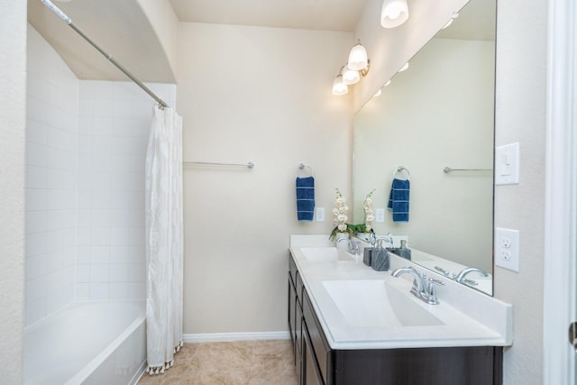 bathroom featuring vanity and shower / bath combo with shower curtain