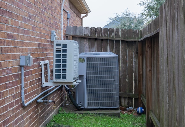 details featuring ac unit and central air condition unit