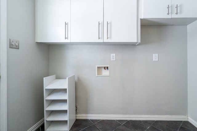 laundry area with cabinets and hookup for a washing machine