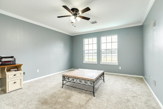 living area featuring light carpet, a textured ceiling, ornamental molding, and ceiling fan