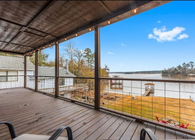 wooden terrace with a water view