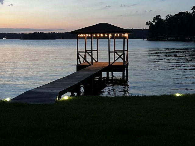 view of dock with a water view