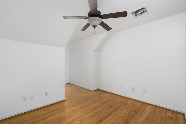 bonus room with vaulted ceiling, ceiling fan, and light hardwood / wood-style flooring