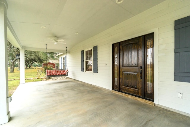 view of patio with a porch and ceiling fan