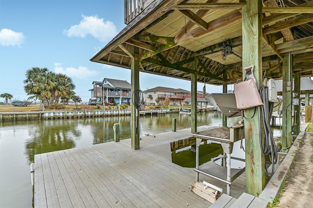 view of dock with a water view