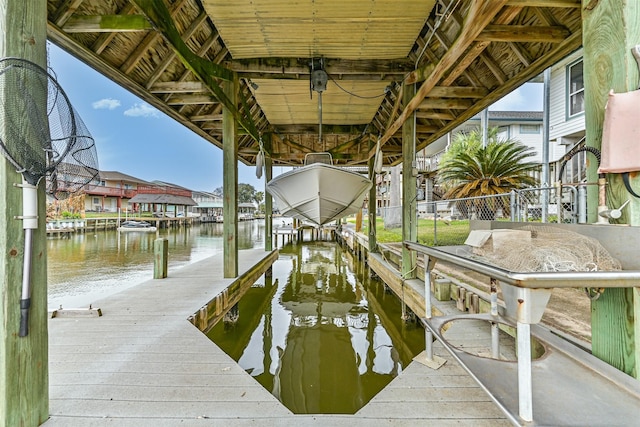 view of dock with a water view