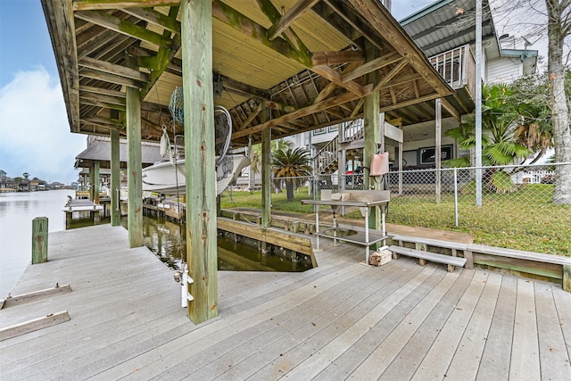 dock area with a water view