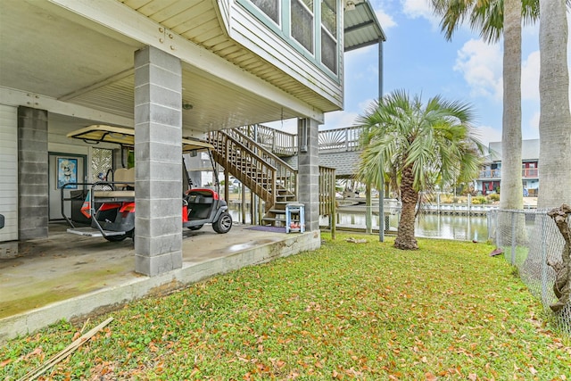 view of yard with a water view