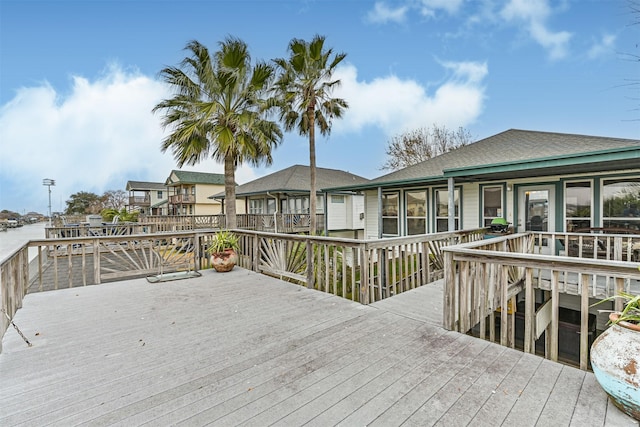 wooden terrace with a water view