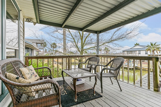 deck featuring a water view