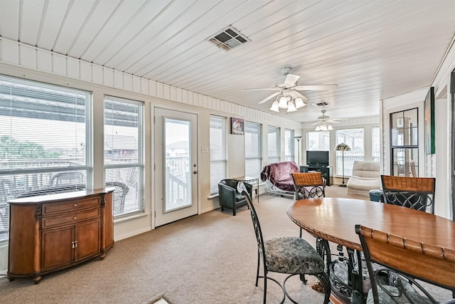 sunroom / solarium with ceiling fan