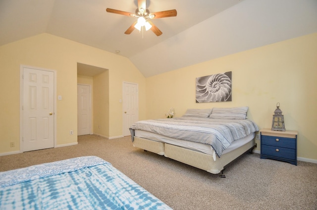 bedroom with light carpet, vaulted ceiling, and ceiling fan