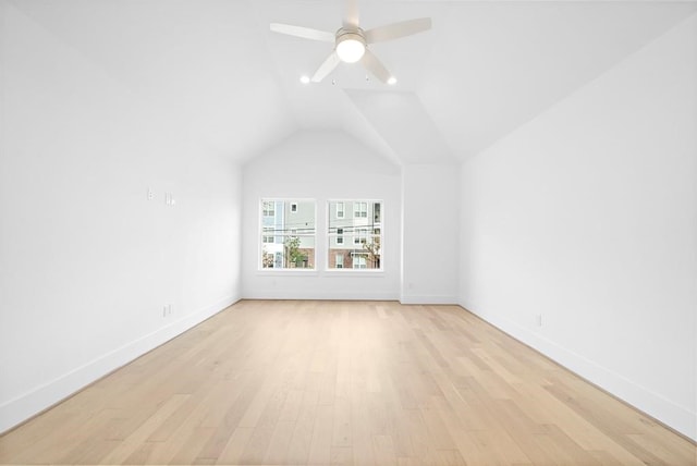 bonus room featuring vaulted ceiling, ceiling fan, and light wood-type flooring