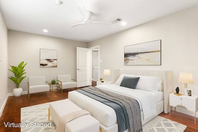 bedroom featuring dark hardwood / wood-style floors and ceiling fan