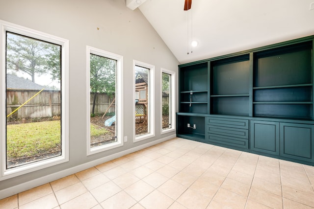 interior space featuring beamed ceiling, high vaulted ceiling, tile patterned floors, and ceiling fan