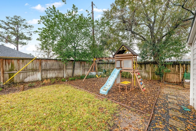 view of play area featuring a yard and a fenced backyard