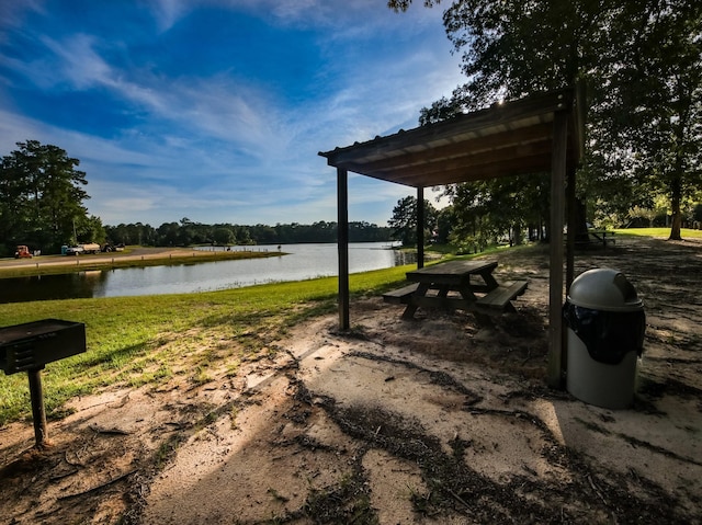 exterior space with a water view