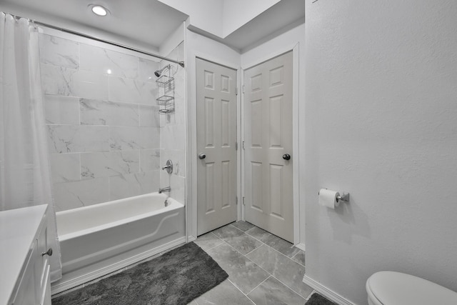 full bathroom with shower / bathtub combination with curtain, vanity, and toilet