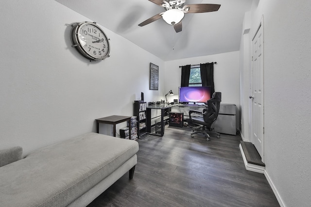 bedroom featuring dark hardwood / wood-style flooring, vaulted ceiling, and ceiling fan