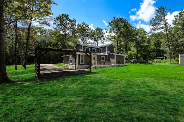 view of yard with covered porch