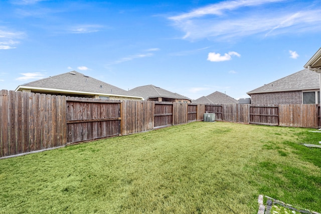 view of yard featuring central AC