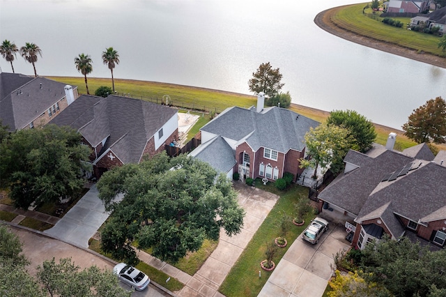 bird's eye view with a water view