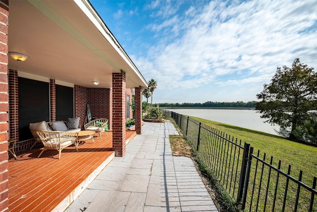 view of patio featuring a water view