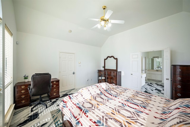 bedroom with ceiling fan, ensuite bathroom, and vaulted ceiling