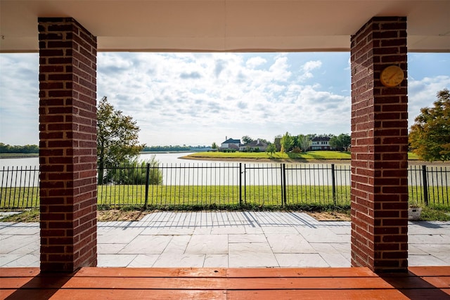 view of patio / terrace featuring a water view