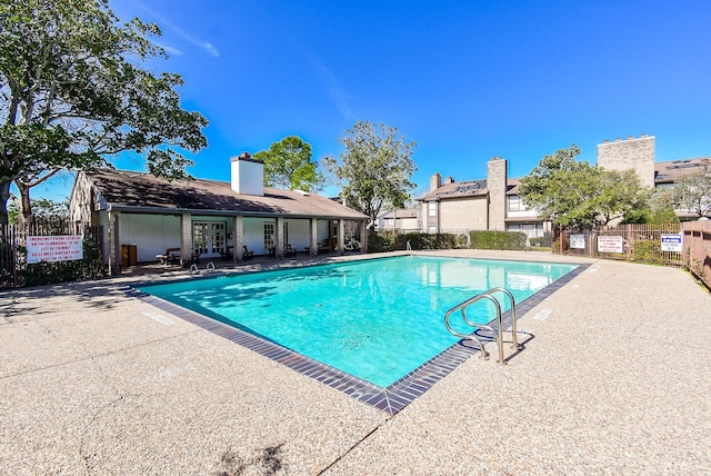 view of pool featuring a patio area