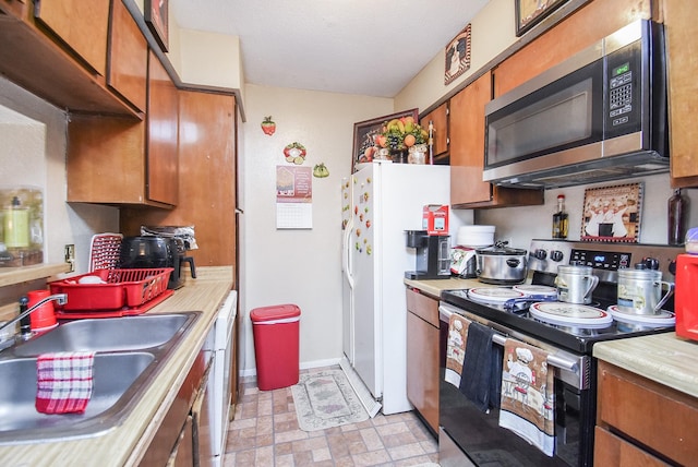 kitchen featuring sink and stainless steel appliances