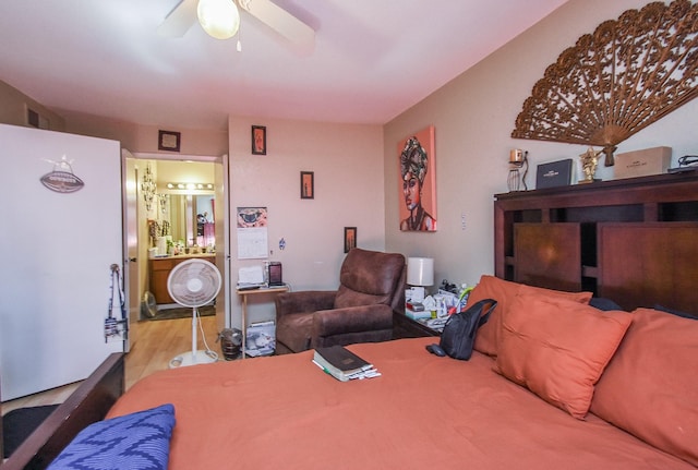 bedroom featuring ceiling fan and light hardwood / wood-style flooring