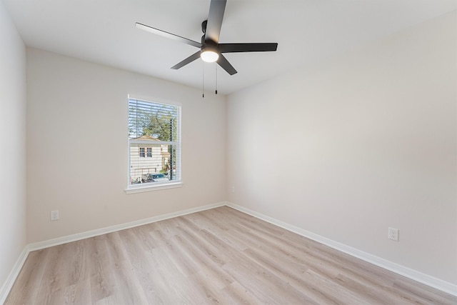 empty room with light hardwood / wood-style flooring and ceiling fan