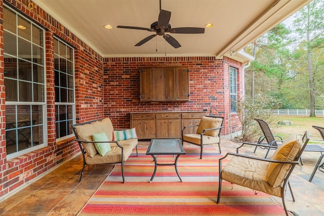 view of patio with ceiling fan