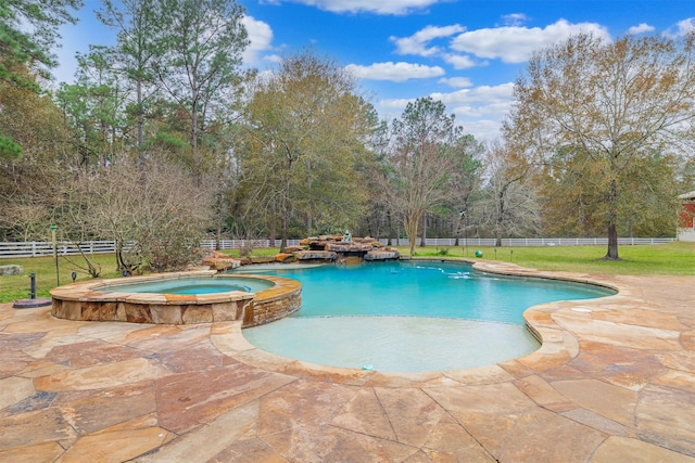 view of swimming pool featuring an in ground hot tub and a patio area